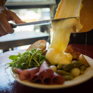 Raclette Top 7 Swiss Foods You must try in Switzerland