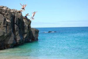 jump off the rock at Waimea Bay