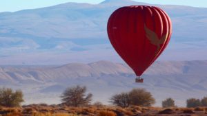 Fly in a hot air balloon over the Atacama Desert sky